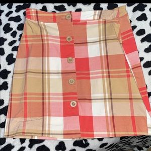 buttons.mini skirt. plaid